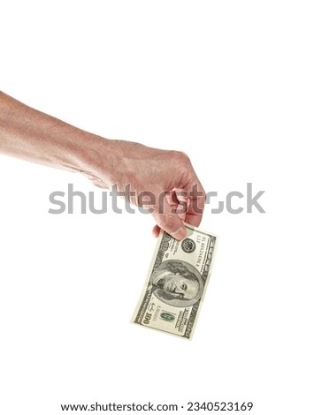 Men's hand holding 100 dollar bill isolated on white background. One hundred dollars bill in man hand to paying and giving