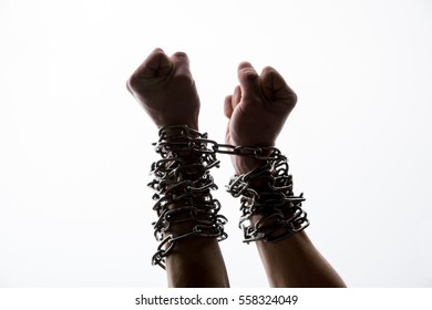 Men's hand in a steel chain