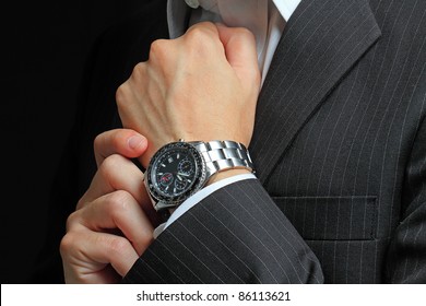 men's hand with a watch. - Shutterstock ID 86113621