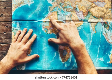 Mens Hands On Paper Map World Stock Photo 774731401 | Shutterstock