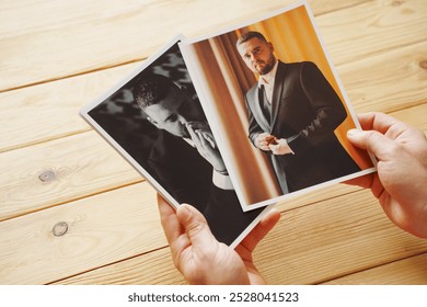 Men's hands put on the wooden table and show wedding photos. storage and printing of photos from important holidays and events. professional photographer and printer. - Powered by Shutterstock