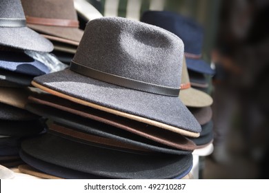 men's hats of felt for sale at a flea market, selected focus and narrow depth of field - Powered by Shutterstock