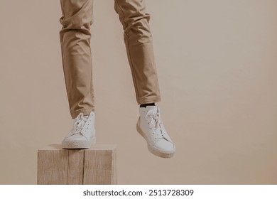 Men's khaki pants, white sneakers  - Powered by Shutterstock