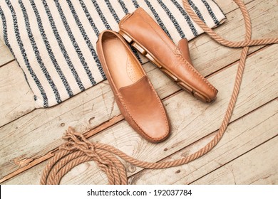 Men's Loafer Shoe on old wood background