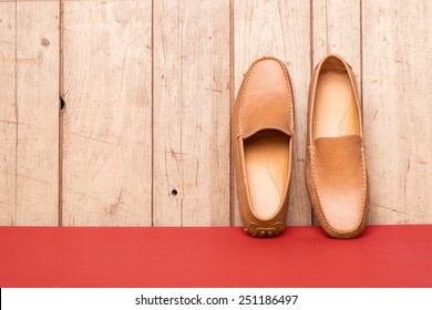 Men's Loafer Shoe On Old Wood Background