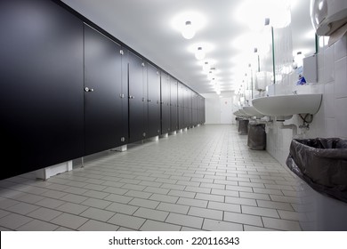 Mens Restroom In An Public Building In White And Black Doors