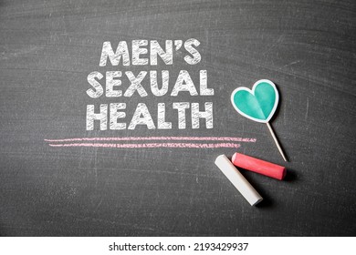 Men's Sexual Health. Text On A Dark Chalk Board.