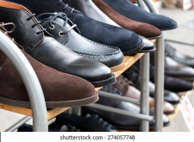 Mens Shoes On Display On Rack Outside Shoeshop