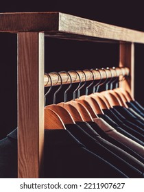 Mens Suits In Different Colors Hanging On Hanger In A Retail Clothes Store, Close-up. Mens Shirts, Suit Hanging On Rack. Hangers With Jackets On Them In Boutique. Suits For Men Hanging On The Rack.