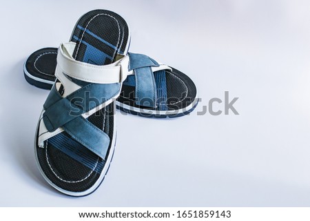 Men's summer shoes isolated on white background. Sandals for men and boys. Comfortable men's shoes. Side view. Space for text.