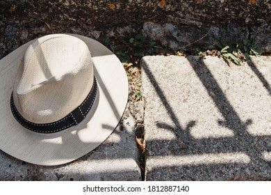 Mens Sunhat On A Stone Bench Top View