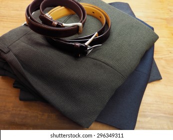 Mens Trousers And Belt On Table Ready For Use.