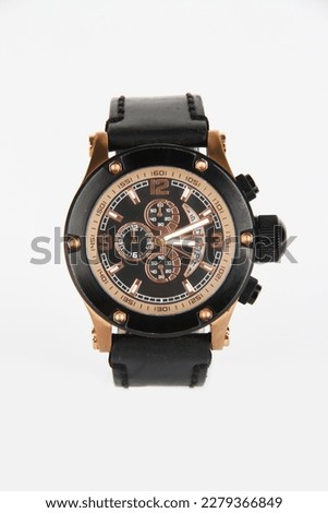Men's watch (Color: Black) on white background (The clock shows 03.11)