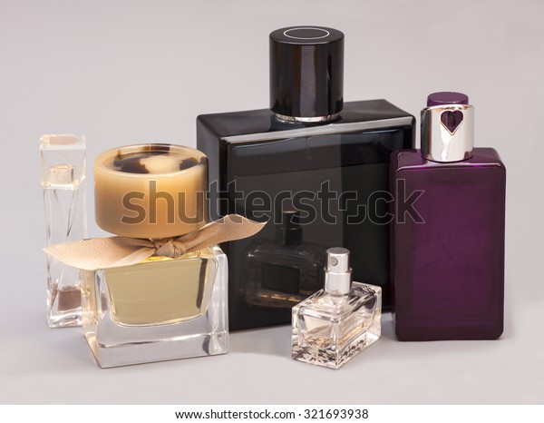 Mens Woman Perfume Bottles On Gray Stock Photo (Edit Now) 321693938