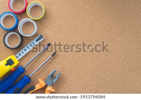 Men's work. The repair tools are on the table. The concept of housework, workshop. Close-up.