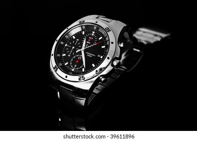 Men's Wrist Watch Isolated Against Black