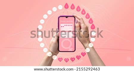 Menstrual cycle tracker mobile app on smartphone screen in hands of woman, graphic representation of period calendar on pink background. Modern technologies for women's health, pregnancy planning