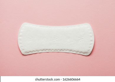 Menstruation Cycle, Feminine Hygiene And Protection, Sanitary Pad On Pastel Pink Background, Top View, Flat Layout