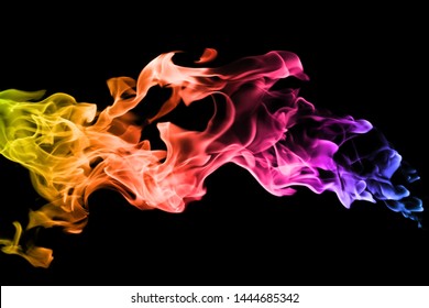 ment of colorful smoke on black background. abstract background