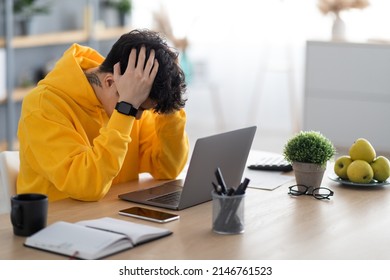 Mental Burnout, Problems At Work. Stressed Asian Guy Grabbing Head Thinking About Troubles Sitting At Desk Using Pc Laptop In Modern Home Office. Crisis, Entrepreneurship Business Issues, Copy Space - Shutterstock ID 2146761523