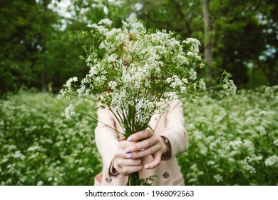 Mental Health Awareness Month, Behavioral Health Care. Post COVID-19 Pandemic Mental Health Challenges. Red-haired Young Woman On Green Nature Trees And Flowers Background