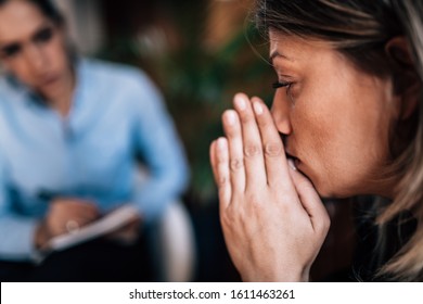 Mental Health Patient With Psychotherapist In Talking Therapy Session