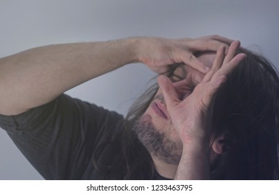 Mental Health Photo. Illustration Of Depression And Psychosis. Mental Health Photo. Illustration Of Depression And Psychosis. The Man Screams And Goes Mad.