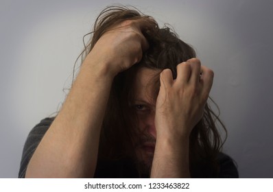 Mental Health Photo. Illustration Of Depression And Psychosis. Mental Health Photo. Illustration Of Depression And Psychosis. The Man Screams And Goes Mad.