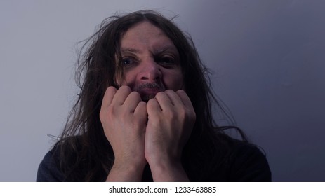 Mental Health Photo. Illustration Of Depression And Psychosis. Mental Health Photo. Illustration Of Depression And Psychosis. The Man Screams And Goes Mad.