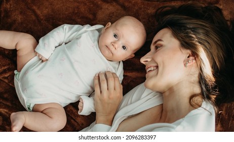 Mental Health In Postpartum Time. Maternal Mental Health. Pregnancy And Postpartum Disorders, Postpartum Baby Blues, Depression. Portrait Of Mother And Newborn Baby