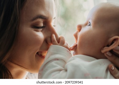 Mental Health in Postpartum Time. Maternal Mental Health. How to avoid pregnancy And Postpartum Disorders, postpartum baby blues, depression. Portrait of happy mother and newborn baby