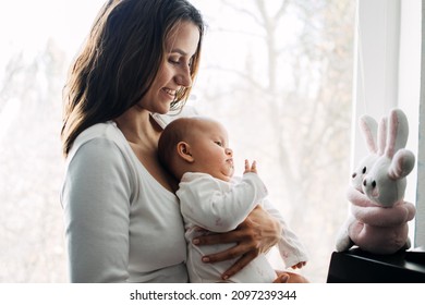 Mental Health In Postpartum Time. Maternal Mental Health. How To Avoid Pregnancy And Postpartum Disorders, Postpartum Baby Blues, Depression. Portrait Of Happy Mother And Newborn Baby