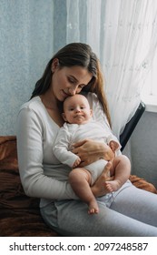 Mental Health In Postpartum Time. Maternal Mental Health. How To Avoid Pregnancy And Postpartum Disorders, Postpartum Baby Blues, Depression. Portrait Of Happy Mother And Newborn Baby