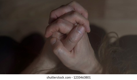 Mental Health Psychosis And Depression Photo. Close-up Hands Shrink From Nerves. Toning, Low Key, Selective Focus.