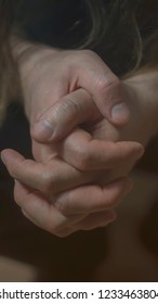 Mental Health Psychosis And Depression Photo. Close-up Hands Shrink From Nerves. Toning, Low Key, Selective Focus.