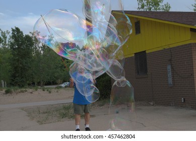 MENTOR OH USA - JULY 21 2016: Bubble Artist Creates Giant Bubbles To Entertain The Crowd At Beachfest.