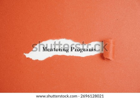 Mentoring programs, written on red torn paper