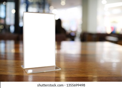 Menu frame space for text marketing promotion standing on wood table in Bar restaurant cafe - Shutterstock ID 1355699498