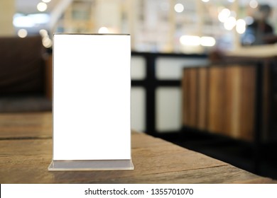 Menu frame space for text marketing promotion standing on wood table in Bar restaurant cafe - Shutterstock ID 1355701070