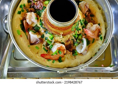 A Menu Fusion Food Of Seafood Mixed In Egg Custard In A Hot Pot On Aluminum Tray On Bamboo Table With Top View.Creativity Customization To Make It Interesting And Enjoyable To Eat.