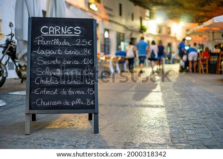 Menu of the meats of restaurant in the sidewalk of Setenil de las Bodegas, Andalucia, Spain