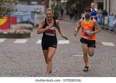 MERANO, ITALY - May 02, 2021: Amazing Older Woman Participant Of The Half Marathon - 21 0975 Km And Fitness Run - 12 5 Km In Merano, South Tirol, Italy On May 2nd, 2021 