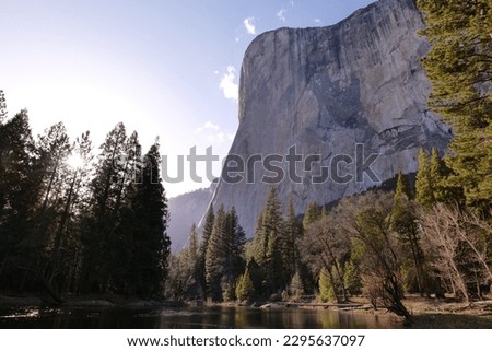 The Merced River is the main river of Yosemite Valley and Yosemite National Park. In the mountains, the river flows quickly, in the valley its course is calm. Stock photo © 