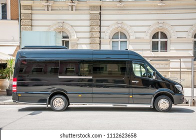 Mercedes Benz sprinter black luxury shuttle bus van parked on the street. June - 12. 2018. Novi Sad, Serbia. Editorial image