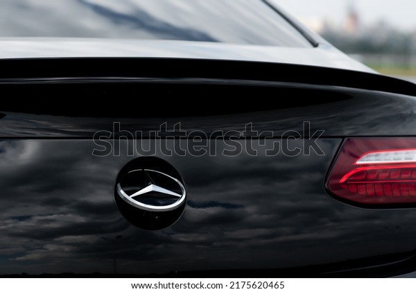 Mercedes-Benz E 300, close-up of the logo on\
the trunk. Reverse gear engaged, reversing camera under the logo. A\
line of cars from the German automaker Mercedes-Benz. Rostov-on-Don\
3july2022