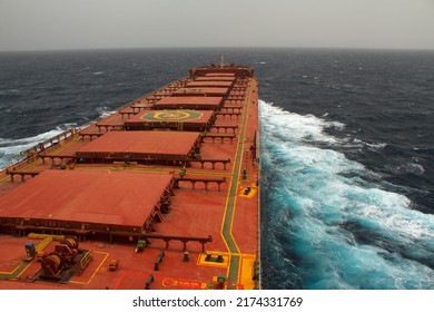 Merchant Ship Carrying Bulk Cargo Is Underway At Sea In Rough Weather