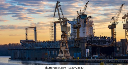 Merchant Ship In The Dry Dock Of The Repair Yard