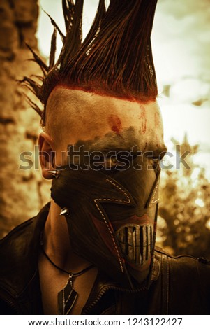 Merciless raider in horrible leather mask 