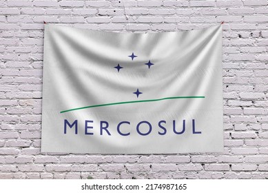 Mercosul Flag Waving In The Wind On Flagpole, On Sky Background