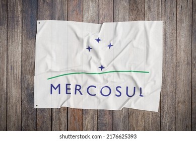 Mercosul Flag Waving In The Wind On Flagpole, On Sky Background	